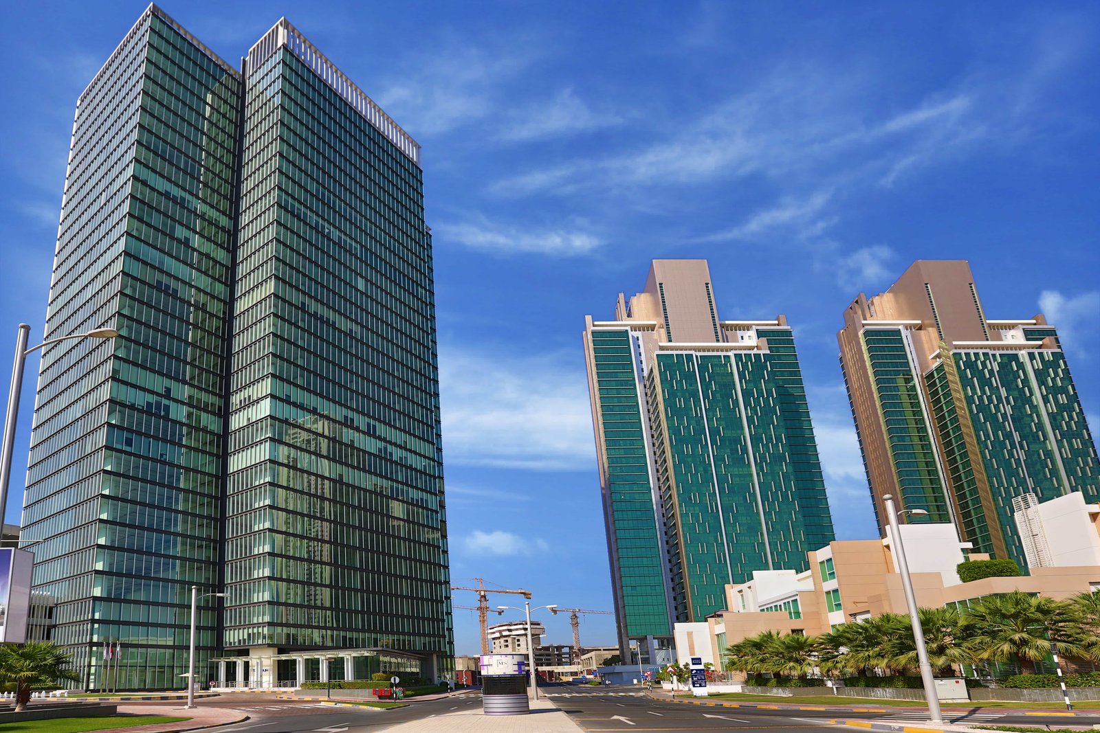 Skyline perspective of Tamouh Tower Marina Square Abu Dhabi highlighting luxurious office tower and strategic business location.