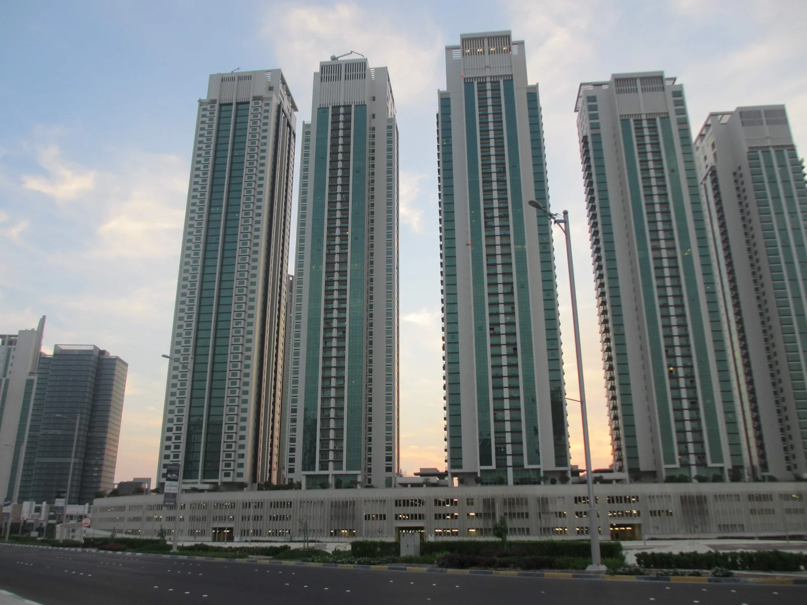 Marina height Towers luxury apartment living room with panoramic Arabian Gulf views and contemporary interior design in Abu Dhabi.